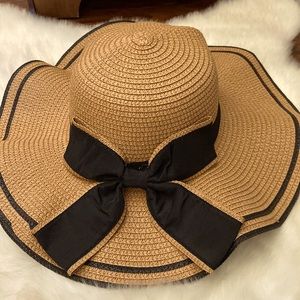 Beautiful floppy straw hat with bow